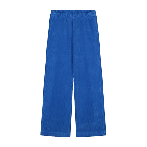 WOMEN'S Trousers Beau Corduroy - COBALT by Yuki kidswear: relaxed wide-leg fit, elastic waistband, organic cotton corduroy in bright blue, shown flat on white—ideal for slow fashion enthusiasts.